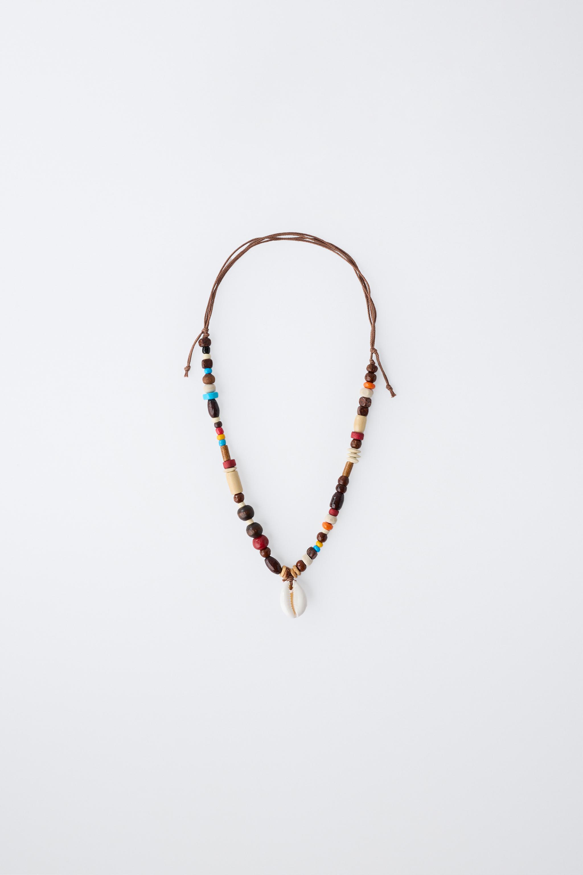 COLLIER FANTAISIE ET COQUILLAGE